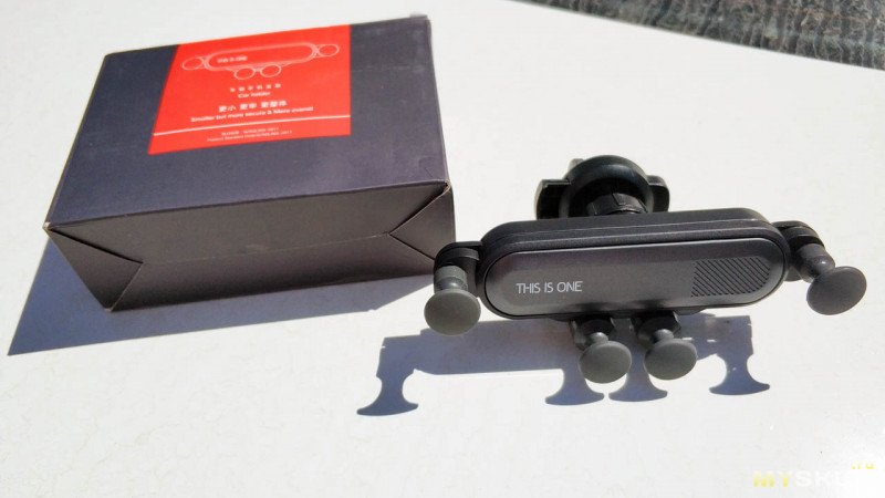 This is one - Гравитационный держатель в автомобиль